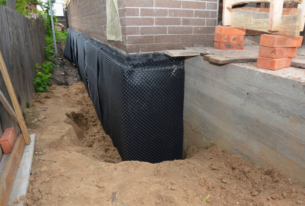 Happy homeowners after waterproofing job in Columbus